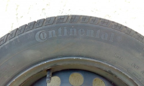 Immagine di Cerchio in ferro da 14 con gomma Continental mai usata.